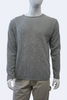 Mannequin wearing a gray textured sweater and beige pants on a white background