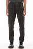 Dark pants worn by a person on a white background
