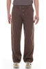 Brown pants worn by a person on a white background