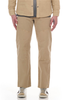 person wearing khaki work pants against white background