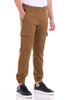 man wearing an ochre colored cargo jogger