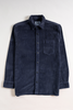 Blue corduroy shirt on a white background