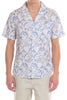 Person wearing a blue and white patterned shirt on a white background