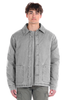 Man wearing a gray denim jacket on a white background