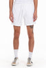 Person wearing white shorts and socks on a white background